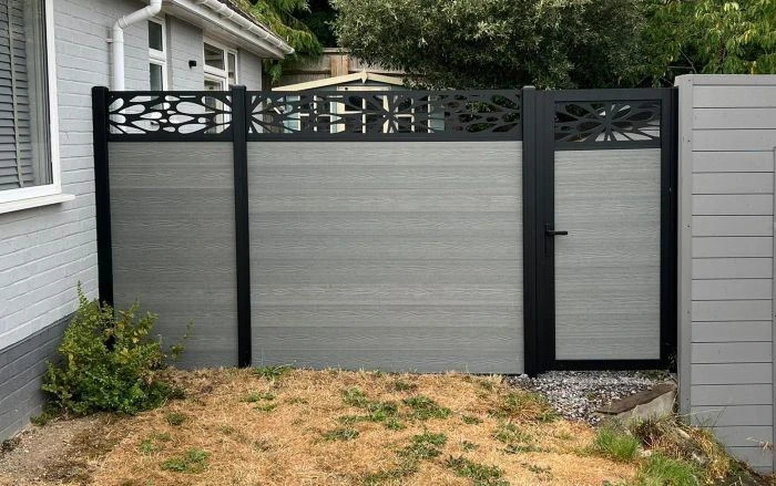 Close-up of composite fencing with decorative top trellis, in Didcot